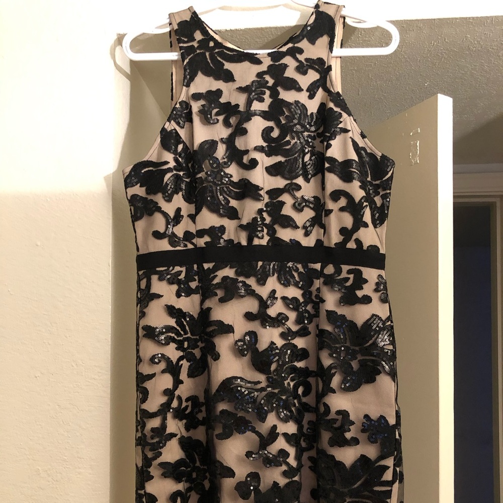 Ina metallic black gown